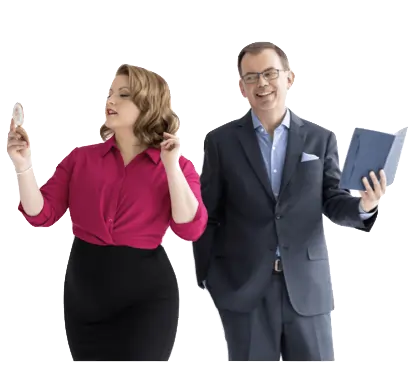 Fun photo of Jason holding a book and trying to connect with Kristin as she adjusts her hair